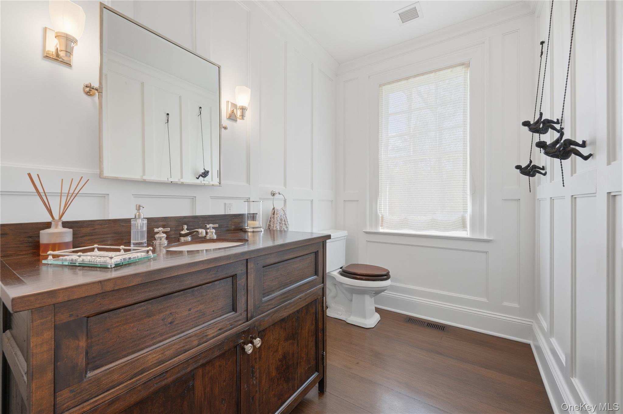 16 Wrights Mill Road Armonk, NY 10504 - Photo 7 of 49 a bathroom with a granite countertop toilet sink and mirror