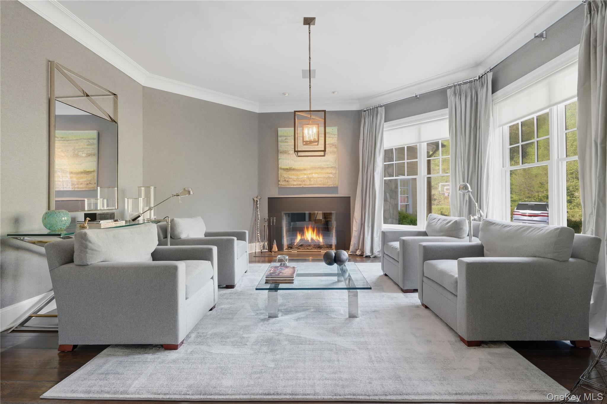 16 Wrights Mill Road Armonk, NY 10504 - Photo 10 of 49 a living room with furniture and a fireplace