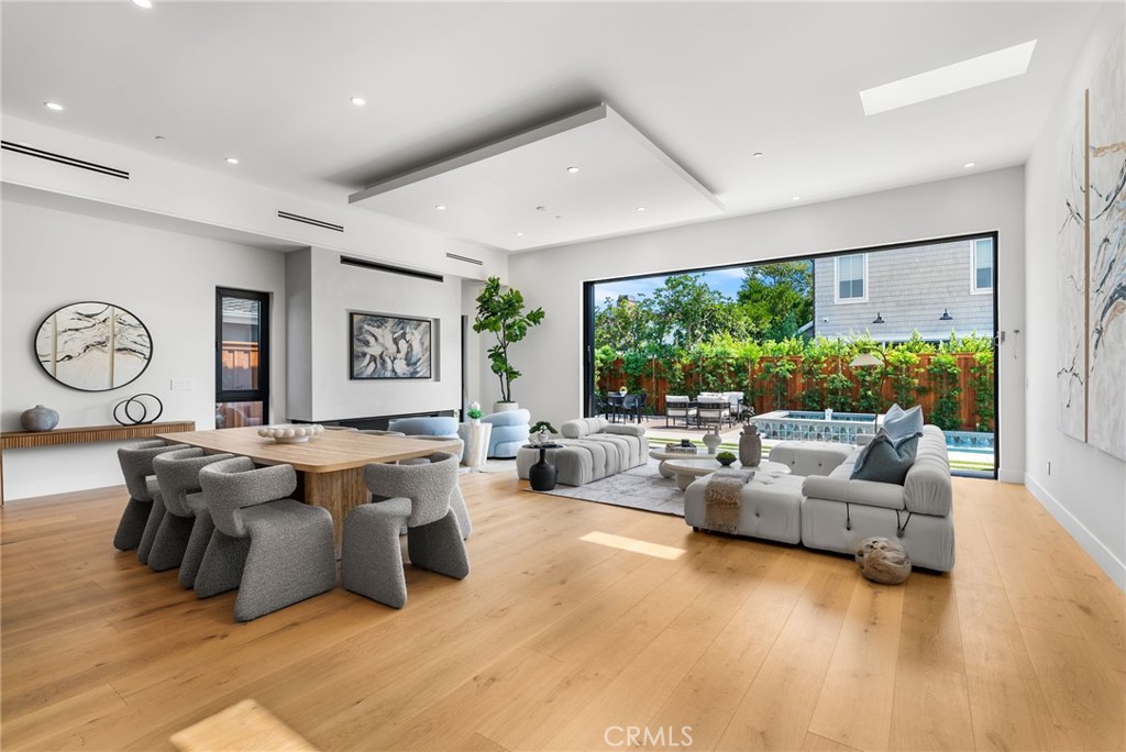1206 Pembroke Lane Newport Beach, CA 92660 - Photo 14 of 49 a living room with furniture and a large window