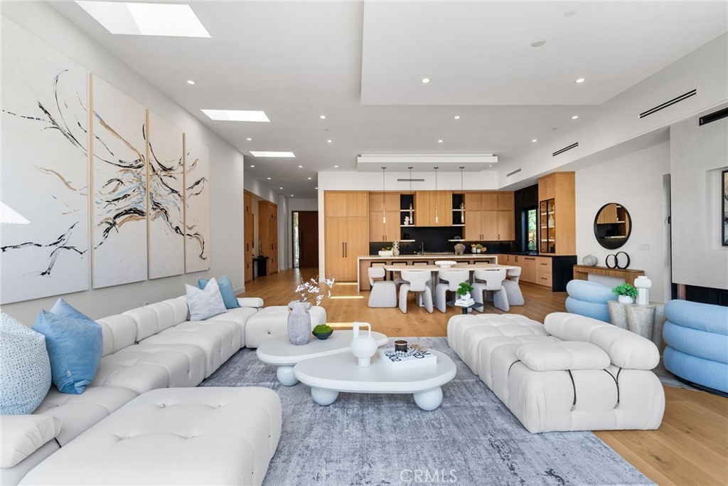 1206 Pembroke Lane Newport Beach, CA 92660 - Photo 23 of 49 a living room with furniture kitchen view and a large window