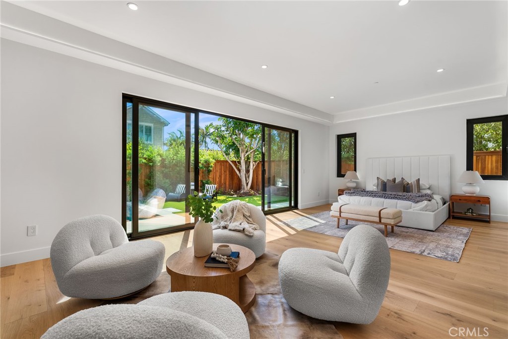 1206 Pembroke Lane Newport Beach, CA 92660 - Photo 30 of 49 a living room with furniture and a large window