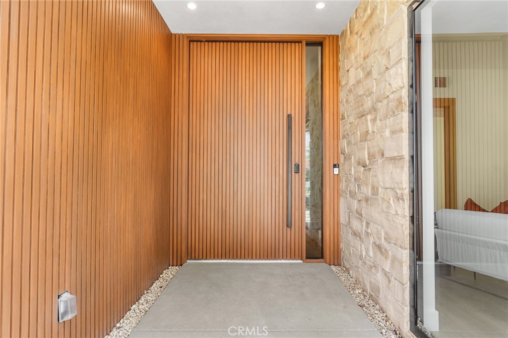 1206 Pembroke Lane Newport Beach, CA 92660 - Photo 3 of 49 a view of a bathroom with a shower curtain