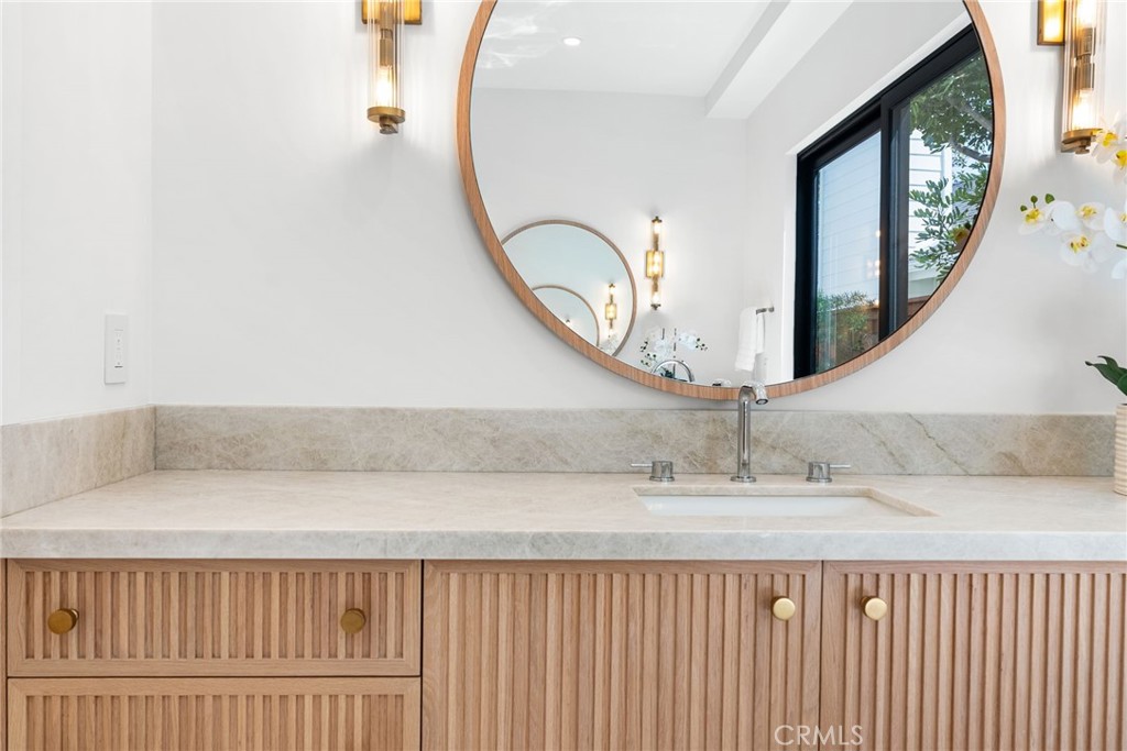 1206 Pembroke Lane Newport Beach, CA 92660 - Photo 34 of 49 a living room with a bed and a large window