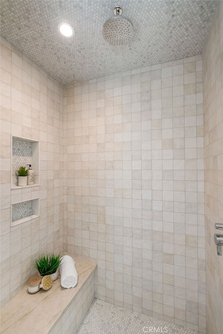 1206 Pembroke Lane Newport Beach, CA 92660 - Photo 35 of 49 a bathroom with a granite countertop sink a toilet and a shower