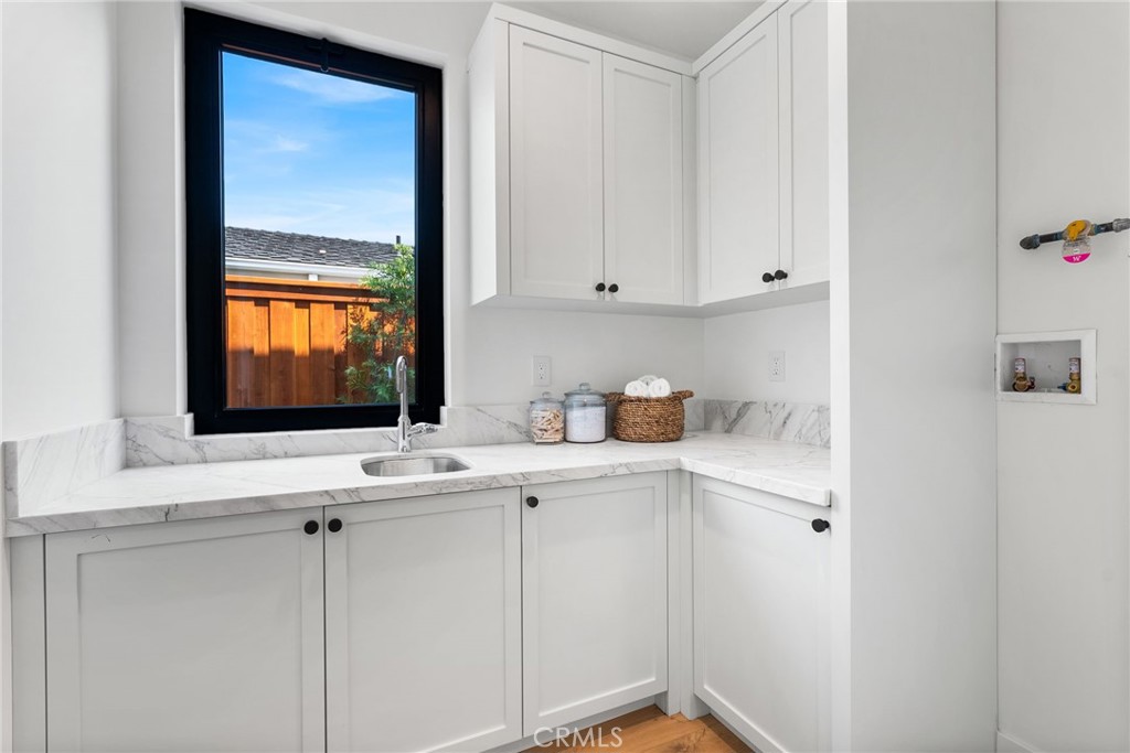 1206 Pembroke Lane Newport Beach, CA 92660 - Photo 45 of 49 a view of cabinets and window