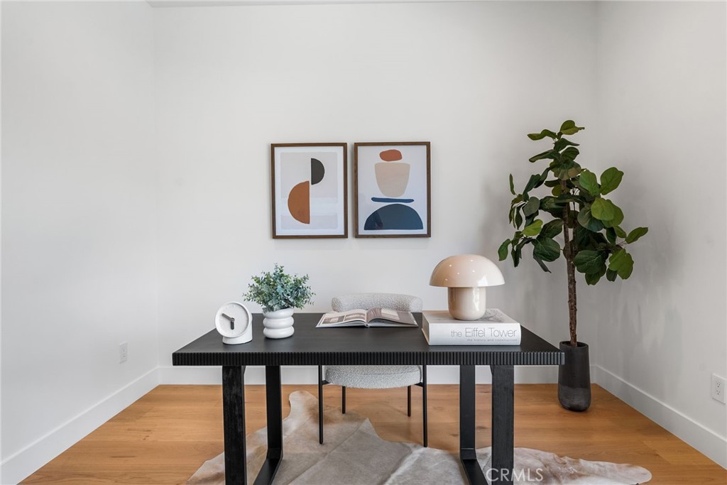 1206 Pembroke Lane Newport Beach, CA 92660 - Photo 46 of 49 a view of a workspace with a table and chair