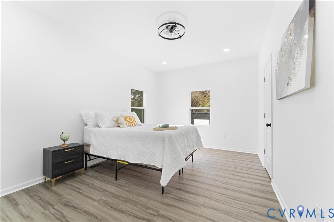 731 Harding Street Petersburg, VA 23803 - Photo 18 of 44 a bed room with a bed and a table