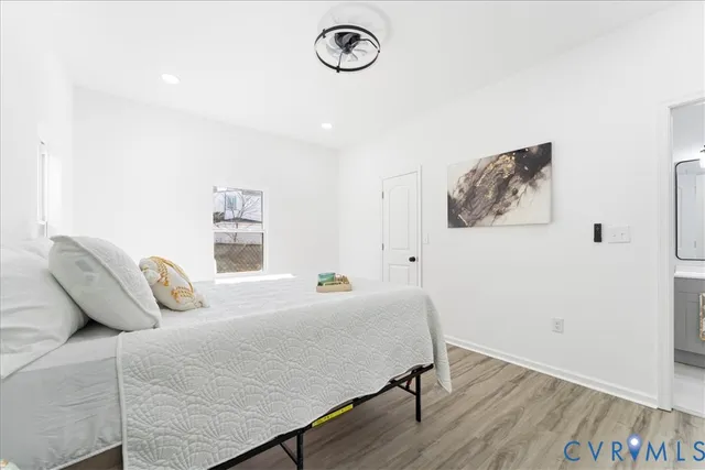 a bed room with a bed and a table