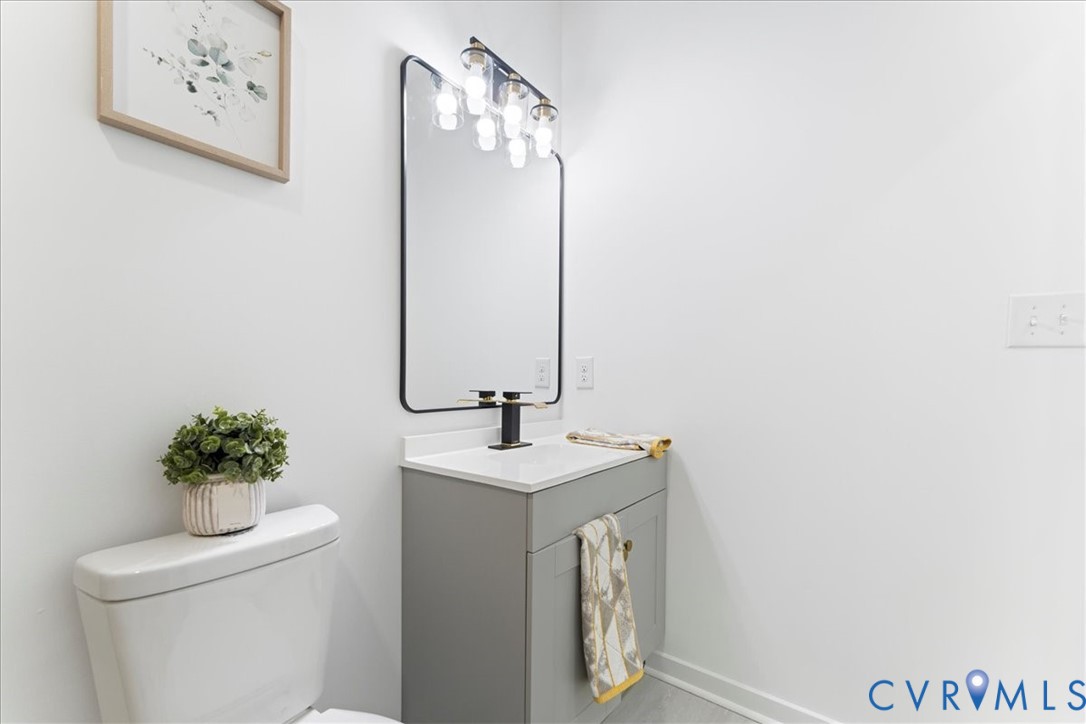 731 Harding Street Petersburg, VA 23803 - Photo 21 of 44 a bathroom with a sink and a mirror