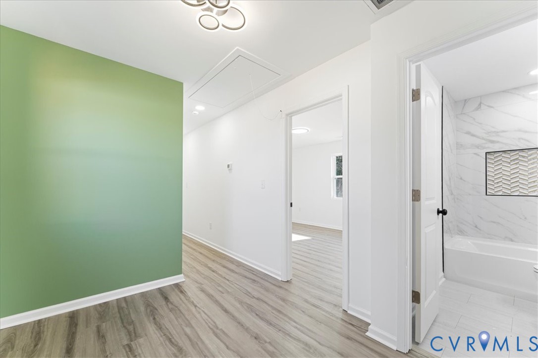 731 Harding Street Petersburg, VA 23803 - Photo 24 of 44 a view of a hallway with wooden floor