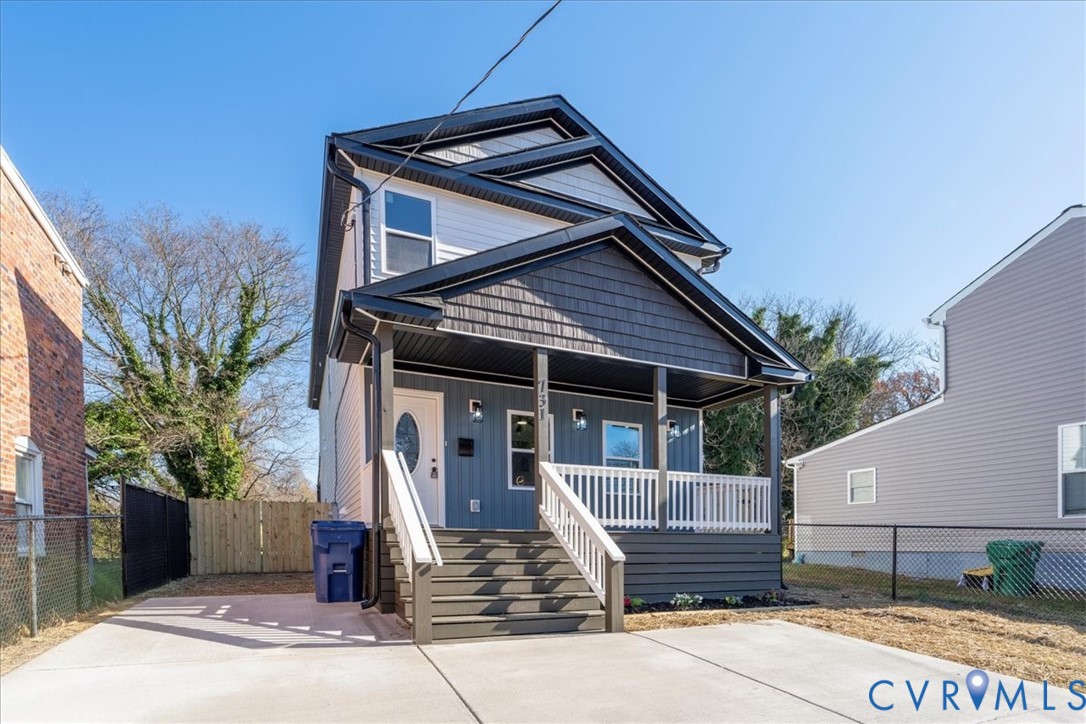 731 Harding Street Petersburg, VA 23803 - Photo 3 of 44 a front view of a house with garden
