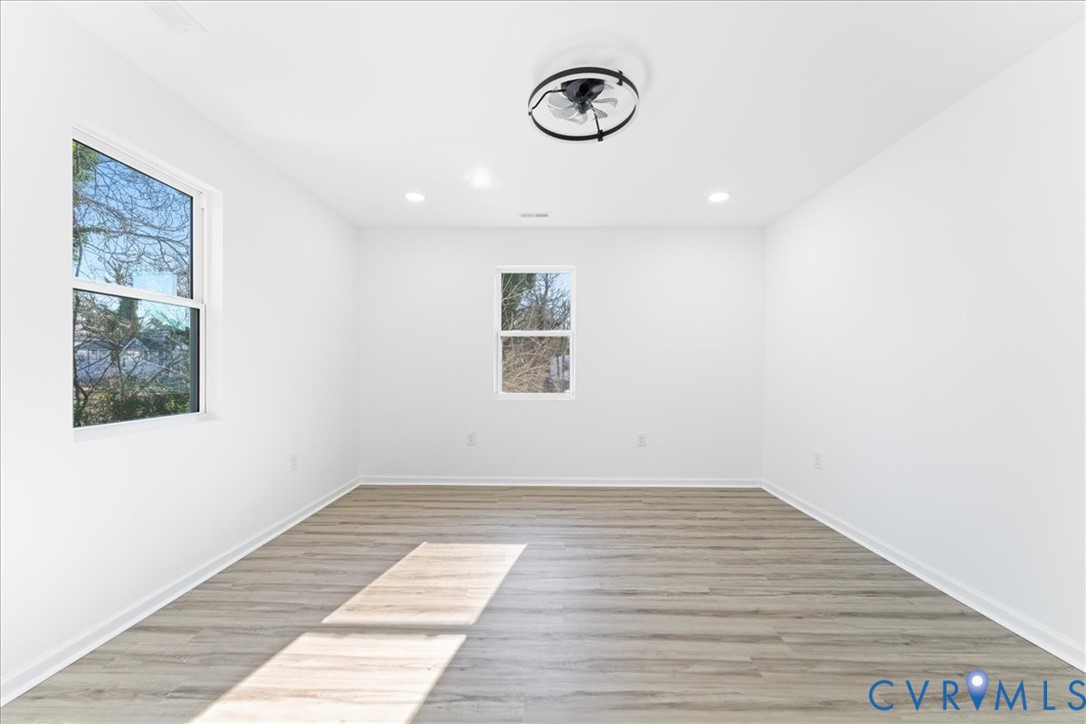731 Harding Street Petersburg, VA 23803 - Photo 32 of 44 a view of a room with wooden floor and window
