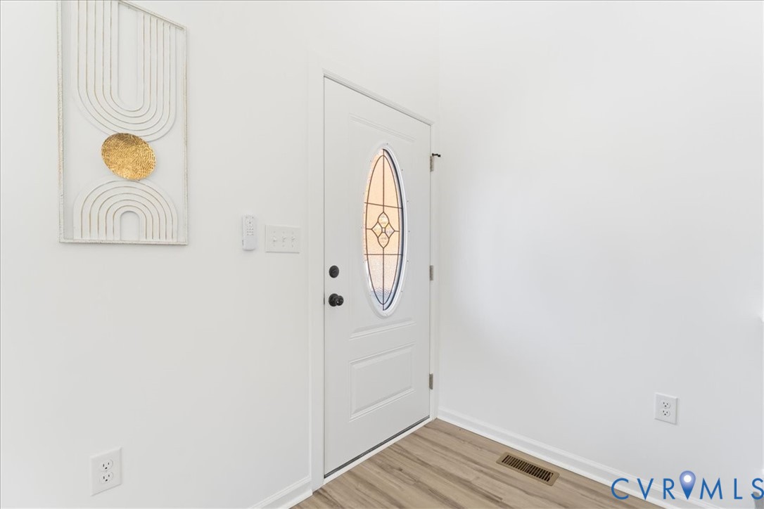 731 Harding Street Petersburg, VA 23803 - Photo 37 of 44 a view of a storage & utility room with wooden floor