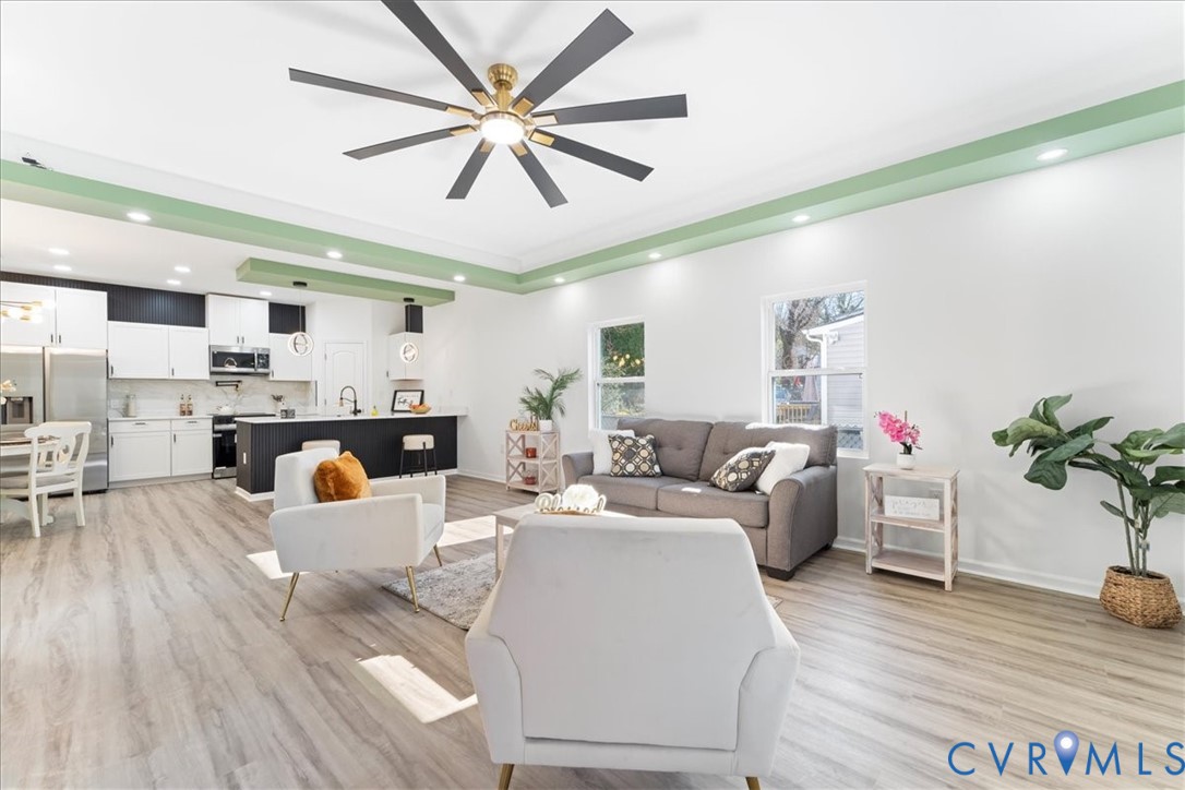 731 Harding Street Petersburg, VA 23803 - Photo 8 of 44 a living room with furniture and a wooden floor