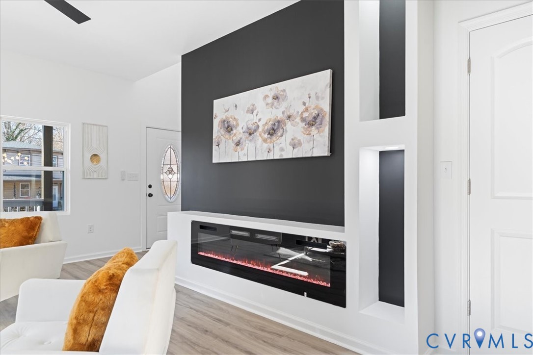 731 Harding Street Petersburg, VA 23803 - Photo 10 of 44 a view of a living room with furniture and a flat screen tv