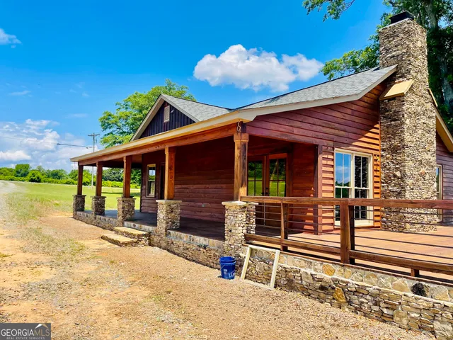 front view of a house with a big yard