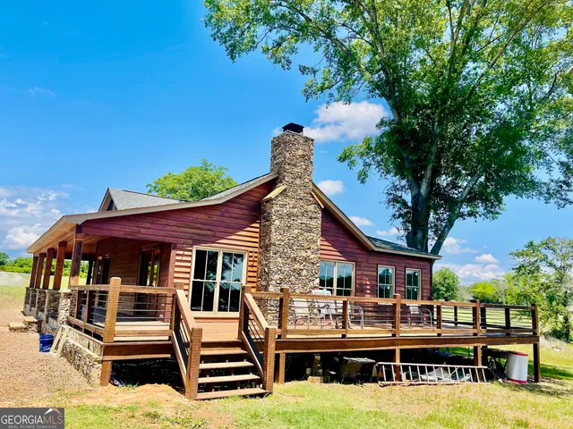 a front view of a house with swimming pool