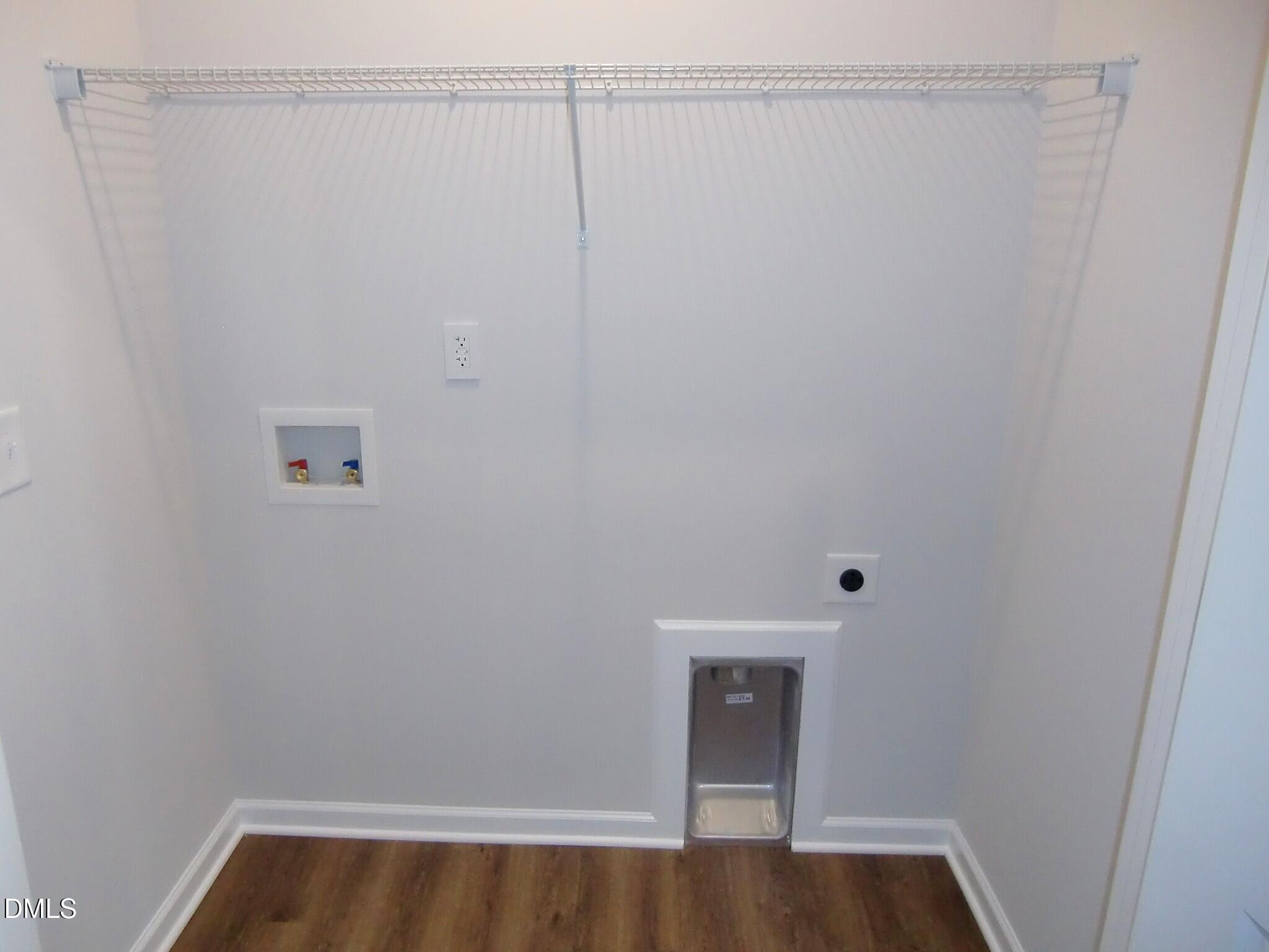 100 Covington Lane Dunn, NC 28334 - Photo 28 of 61 a view of small space with empty racks on the wall
