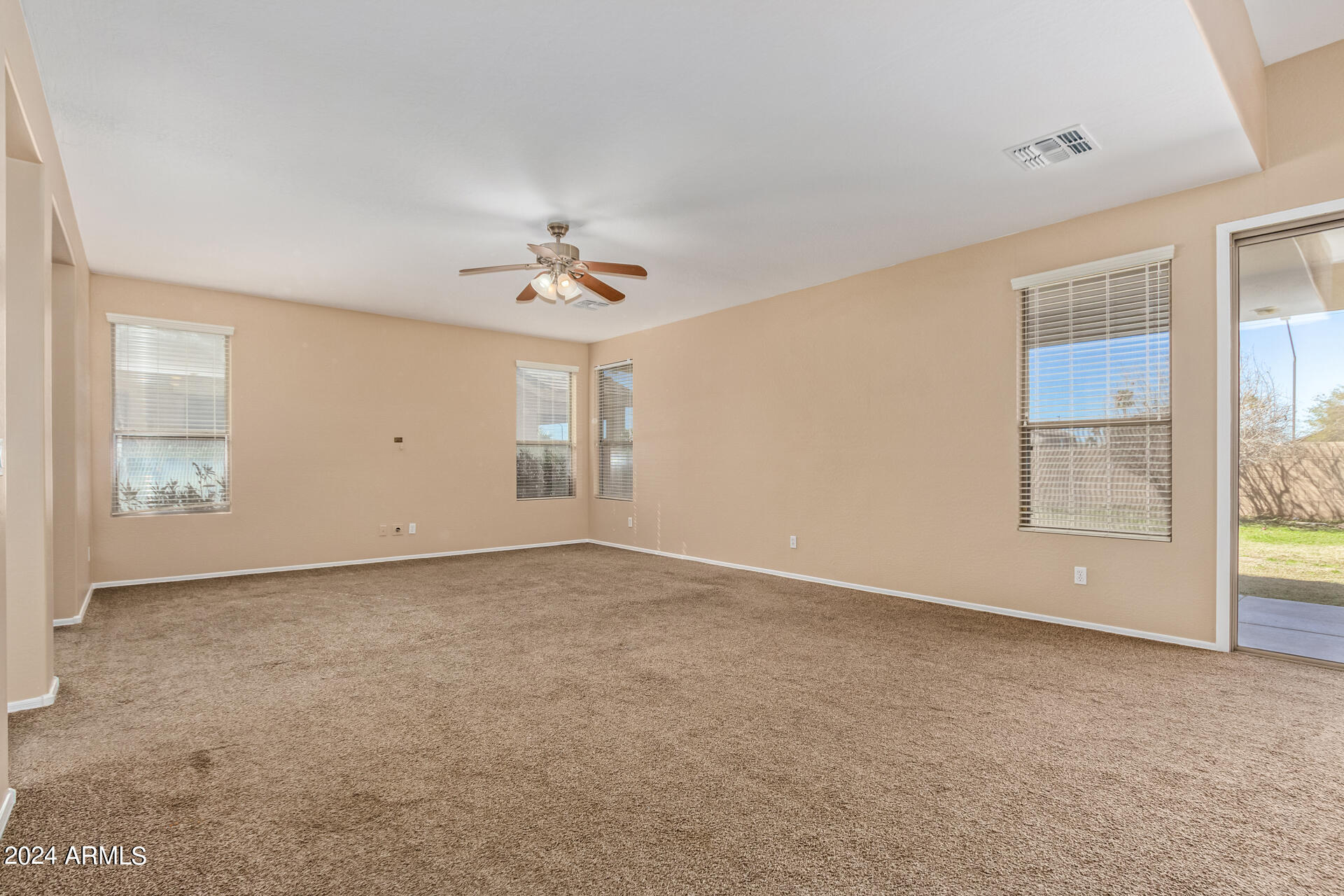 504 North Swallow Lane Gilbert, AZ 85234 - Photo 29 of 54 a view of an empty room with a window