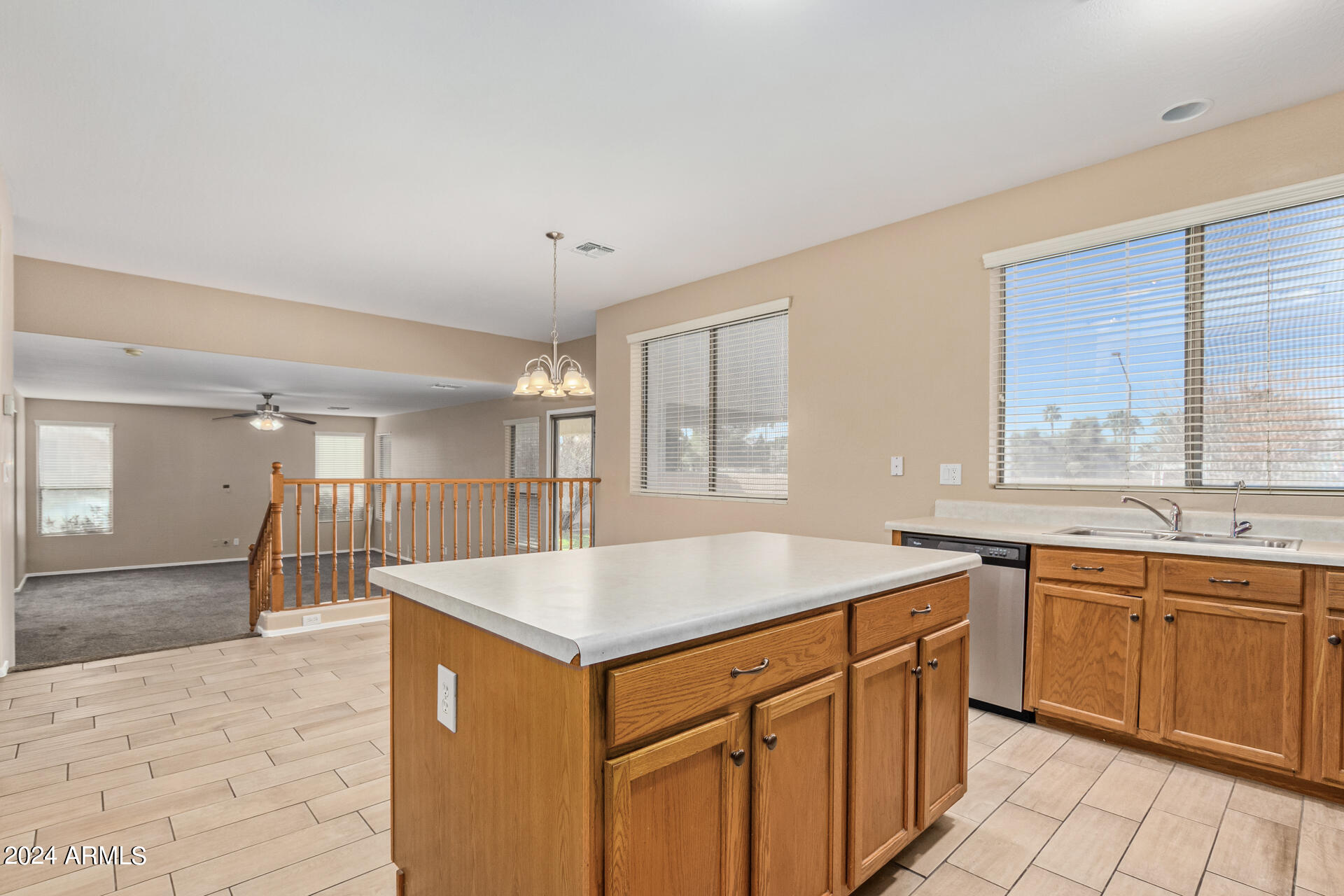 504 North Swallow Lane Gilbert, AZ 85234 - Photo 41 of 54 a kitchen with a sink and cabinets