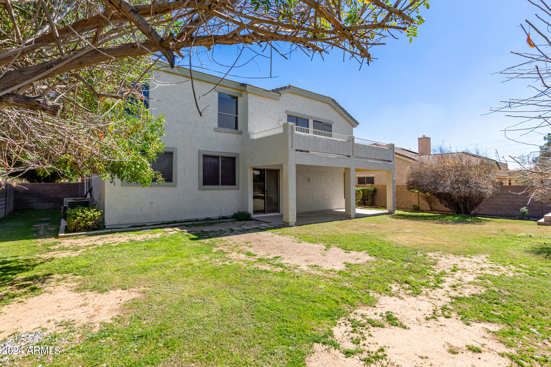 504 North Swallow Lane Gilbert, AZ 85234 - Photo 50 of 54 a house that has a big yard in front of it