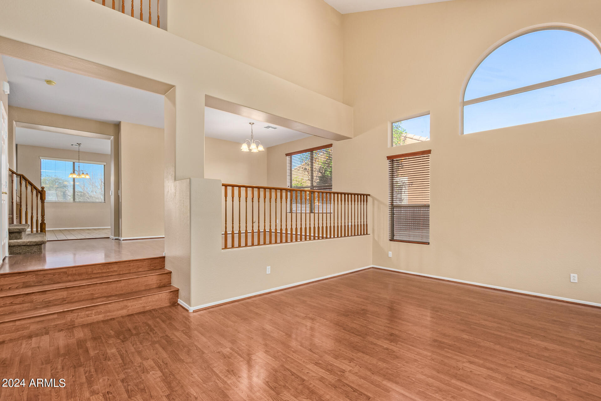 504 North Swallow Lane Gilbert, AZ 85234 - Photo 6 of 54 a view of entryway with wooden floor