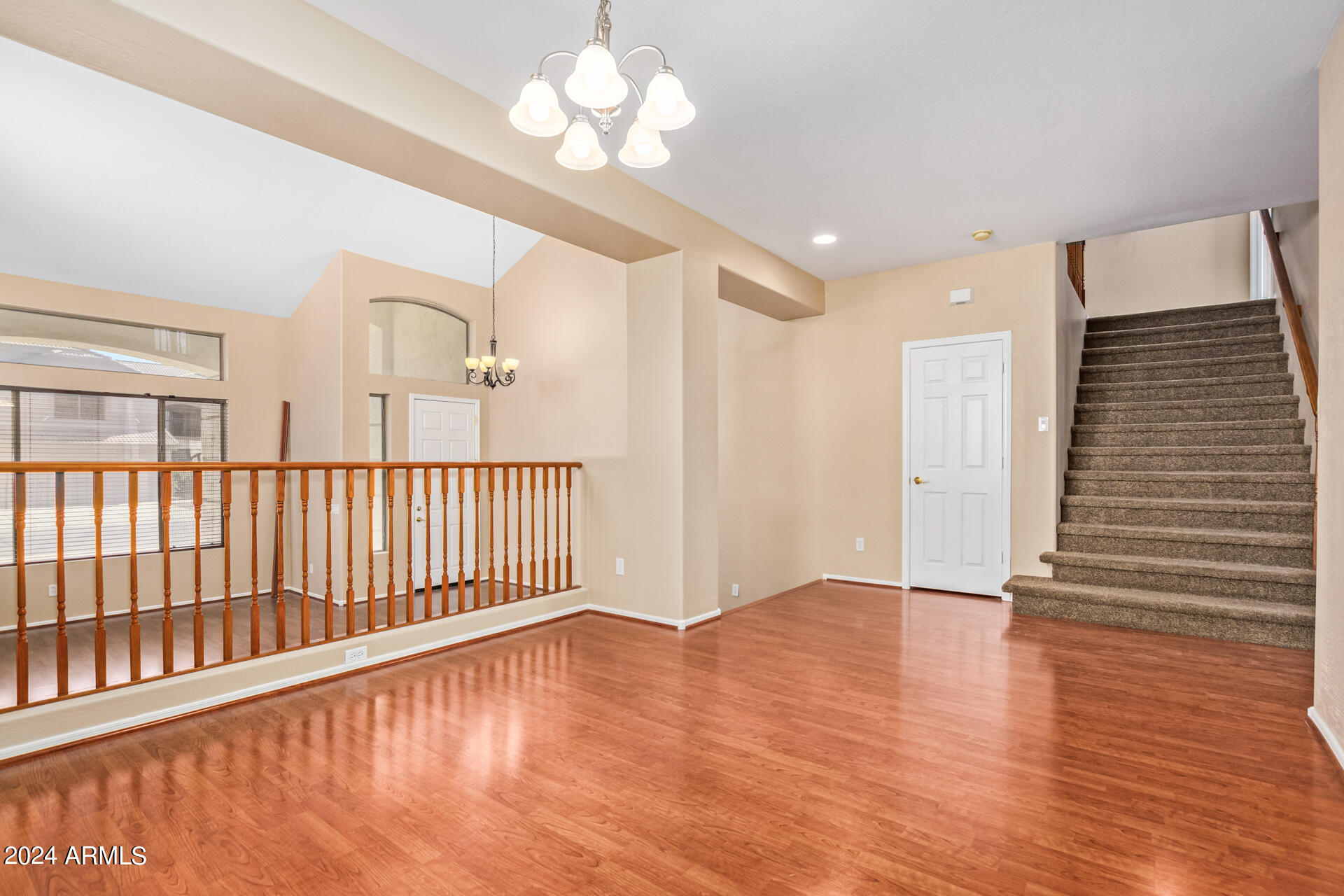 504 North Swallow Lane Gilbert, AZ 85234 - Photo 7 of 54 a view of a livingroom with wooden floor