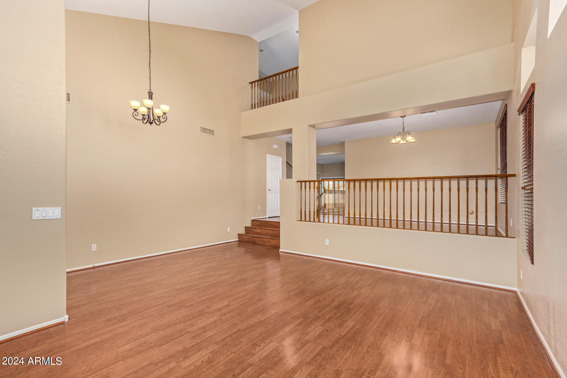 504 North Swallow Lane Gilbert, AZ 85234 - Photo 9 of 54 a view of a room with wooden floor
