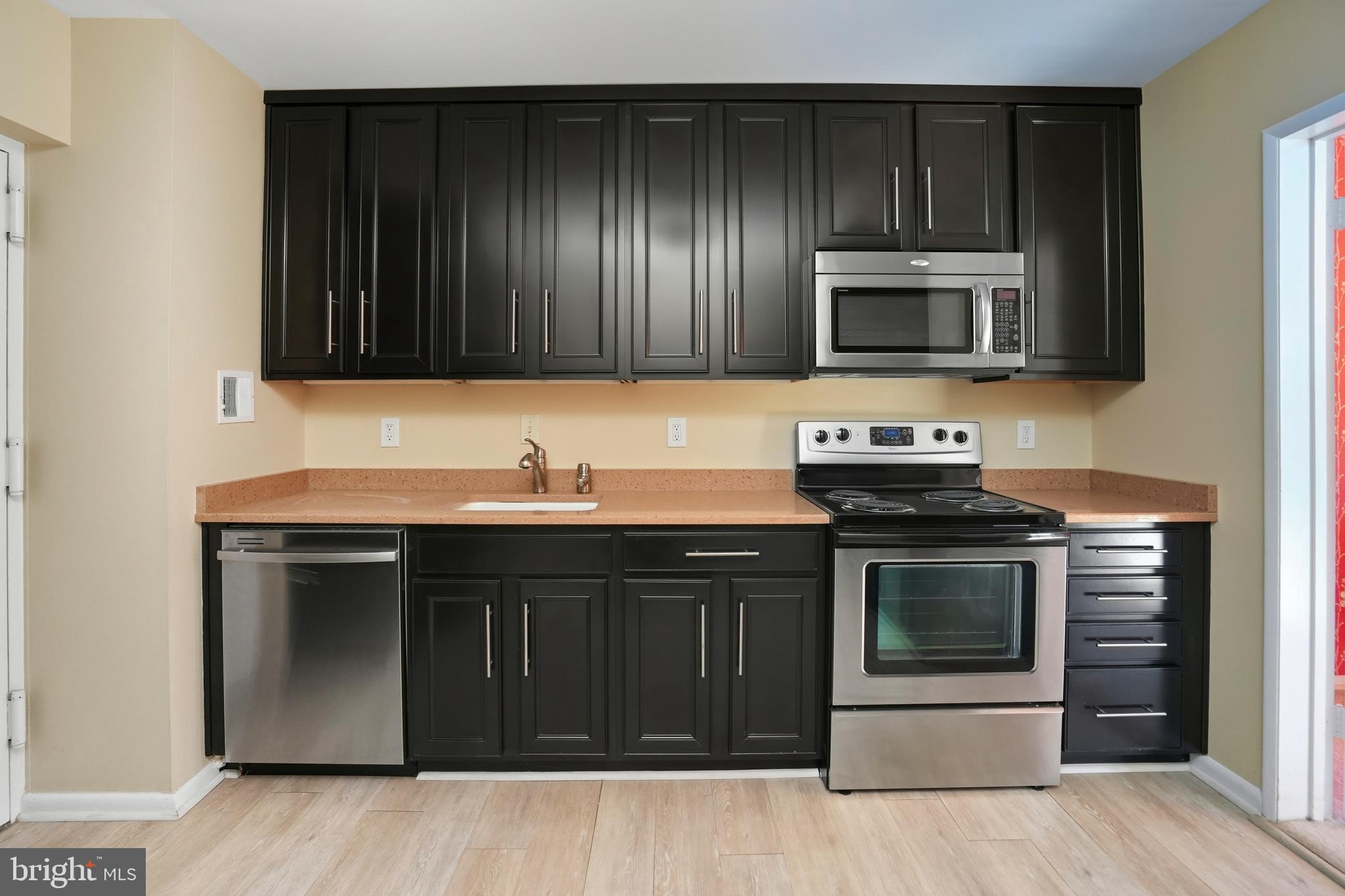 7 Slade Avenue, Unit 414 Baltimore, MD 21208 - Photo 10 of 40 Spacious Kitchen with Granite Countertops