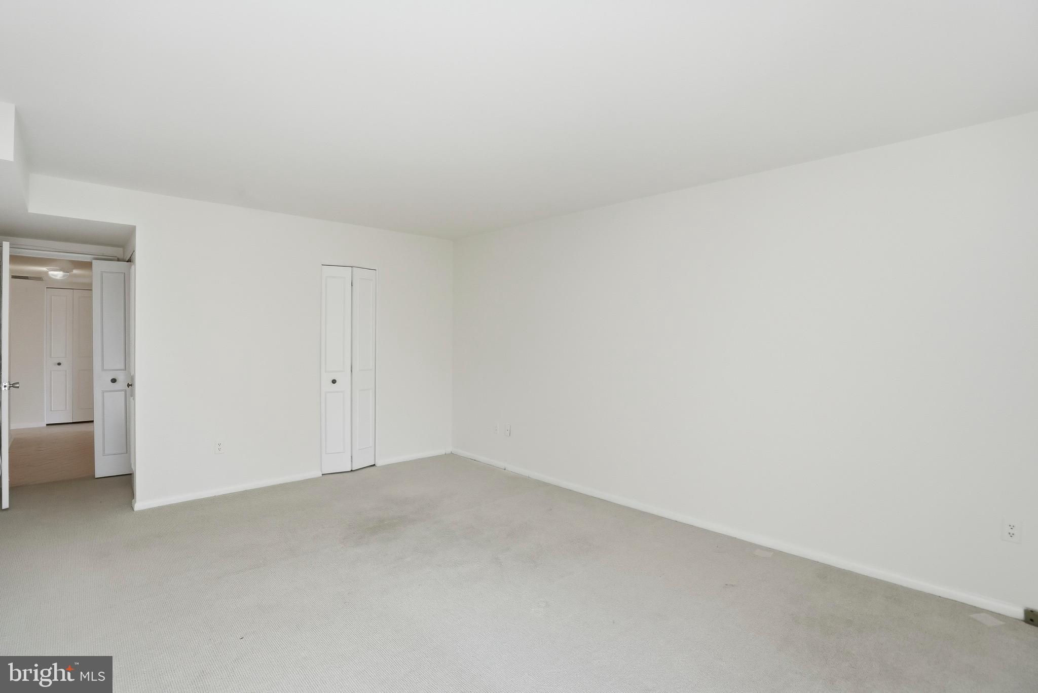 7 Slade Avenue, Unit 414 Baltimore, MD 21208 - Photo 14 of 40 Primary Bedroom with Two Walk in Closets