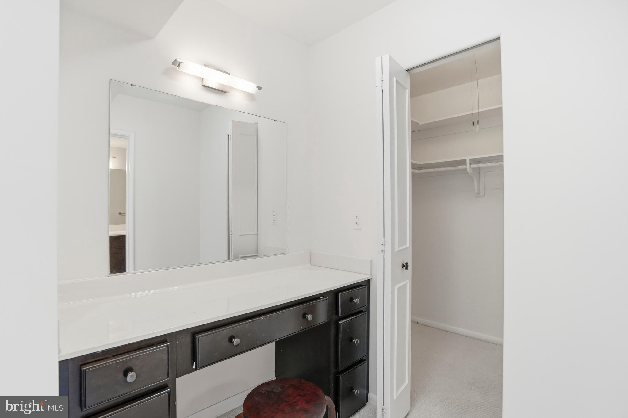 7 Slade Avenue, Unit 414 Baltimore, MD 21208 - Photo 17 of 40 Primary Bedroom Vanity