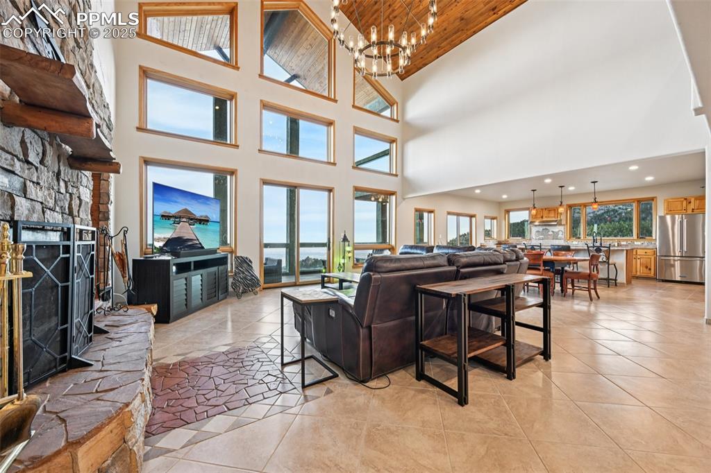 1417 Forest Road Manitou Springs, CO 80829 - Photo 11 of 50 a view of a dinning table and chairs in the patio