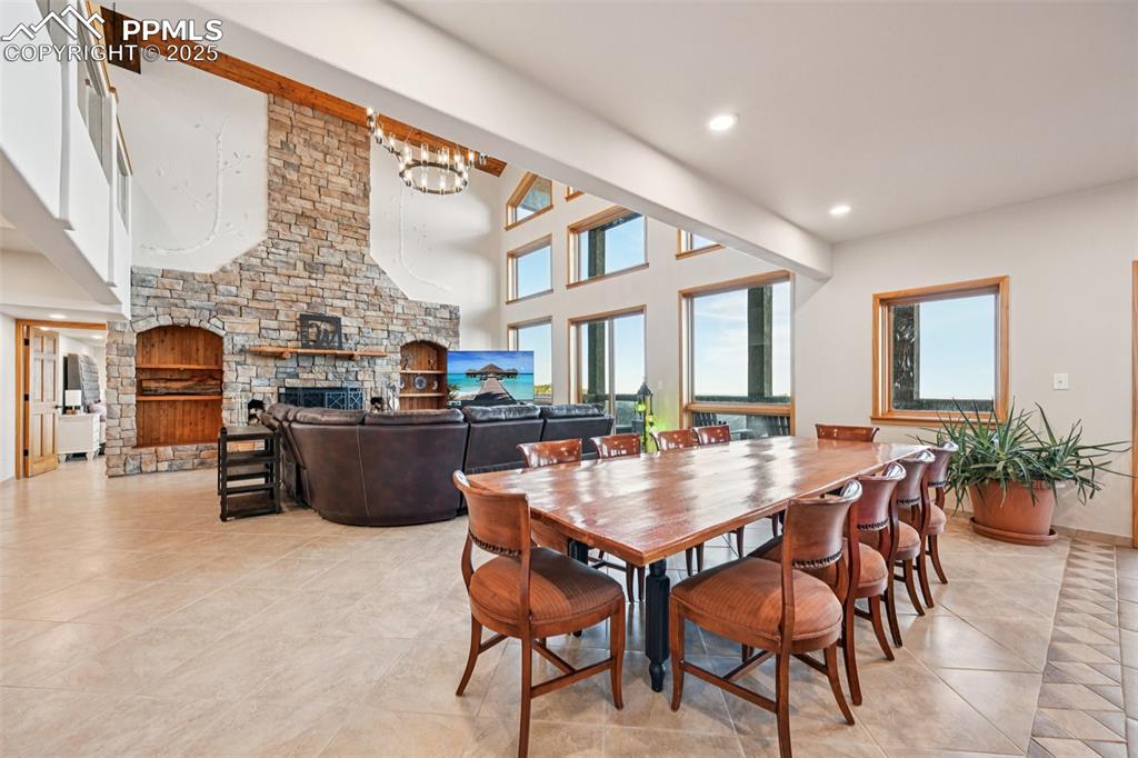 1417 Forest Road Manitou Springs, CO 80829 - Photo 12 of 50 a living room with furniture a window and kitchen view