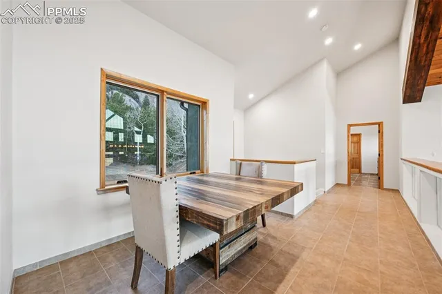 a bedroom with a bed and flat screen tv