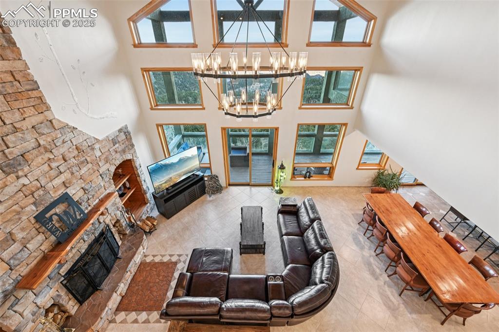 1417 Forest Road Manitou Springs, CO 80829 - Photo 7 of 50 a view of a livingroom with furniture and a fireplace