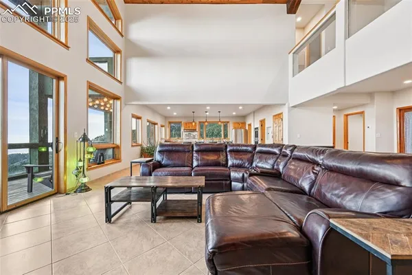 a view of balcony with furniture