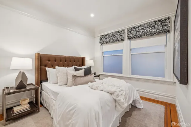 a kitchen with stainless steel appliances a stove a microwave and cabinets