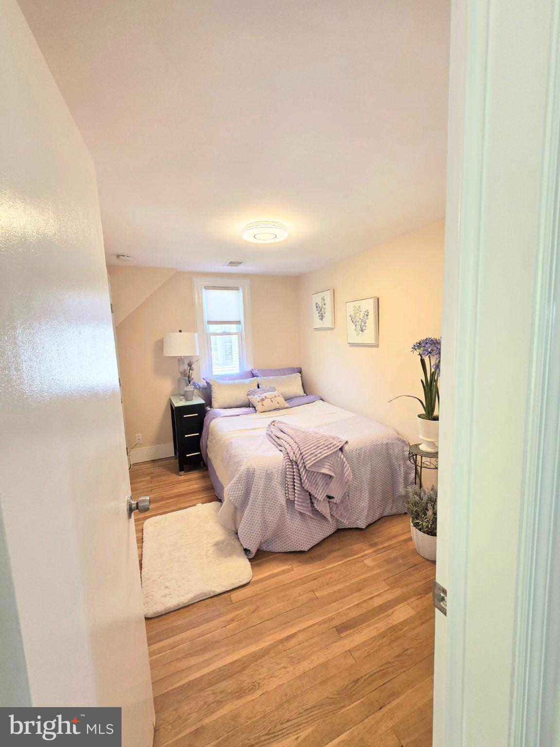 3712 West Cold Spring Lane Baltimore, MD 21215 - Photo 32 of 39 Cozy retreat with warm wooden floors.