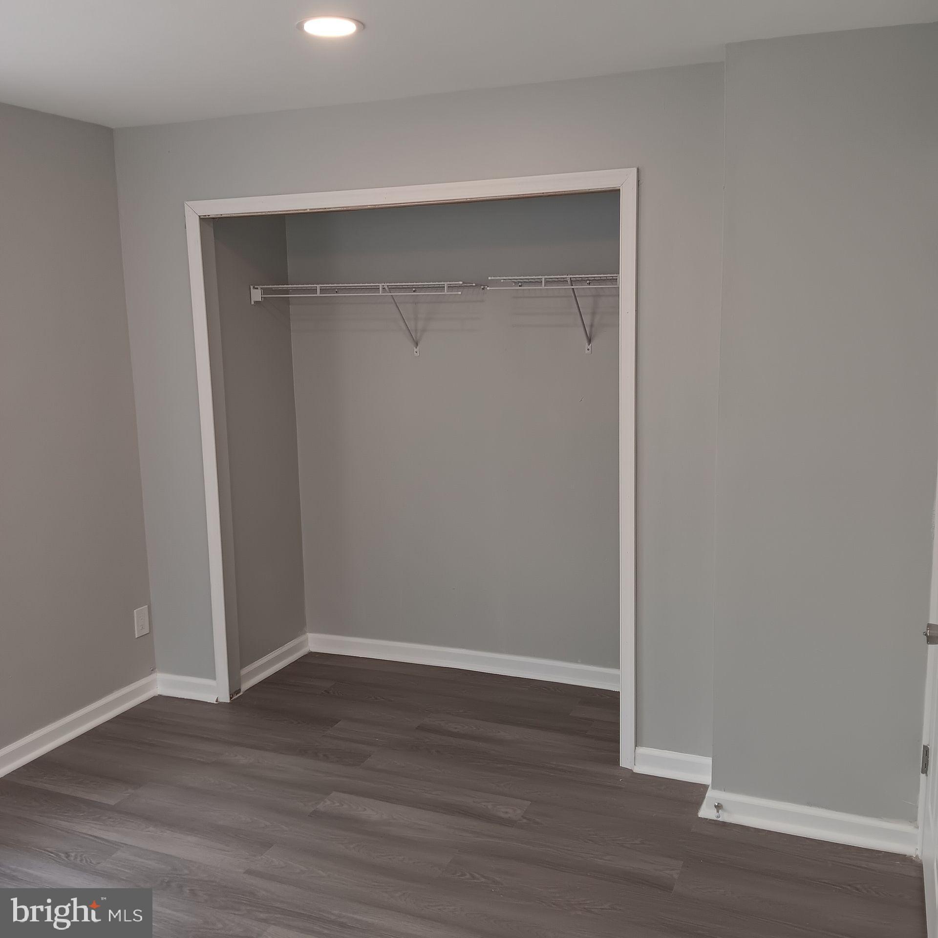 2036 North Gratz Street, Unit 2 Philadelphia, PA 19121 - Photo 12 of 14 a view of an empty room with wooden floor