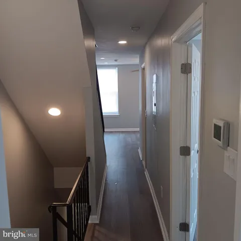 a view of hallway with stairs