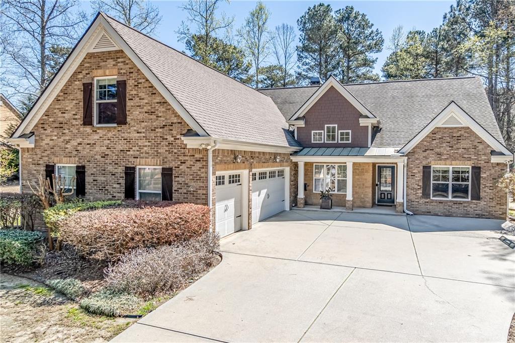 665 Herring Road Grayson, GA 30017 - Photo 1 of 1 a front view of a house with a yard
