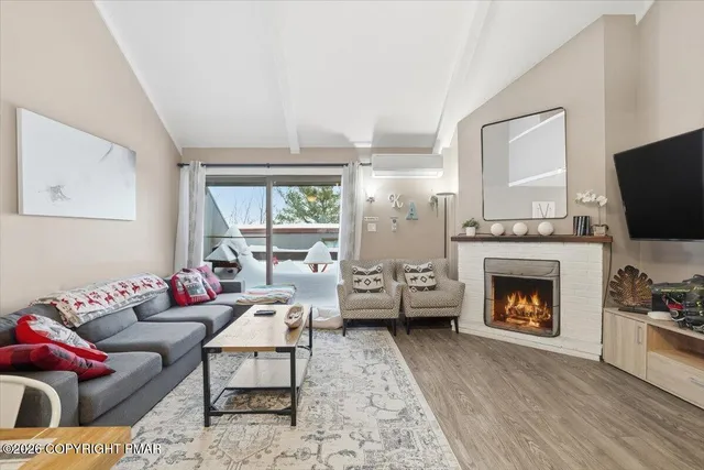 a bedroom with a bed and a chair