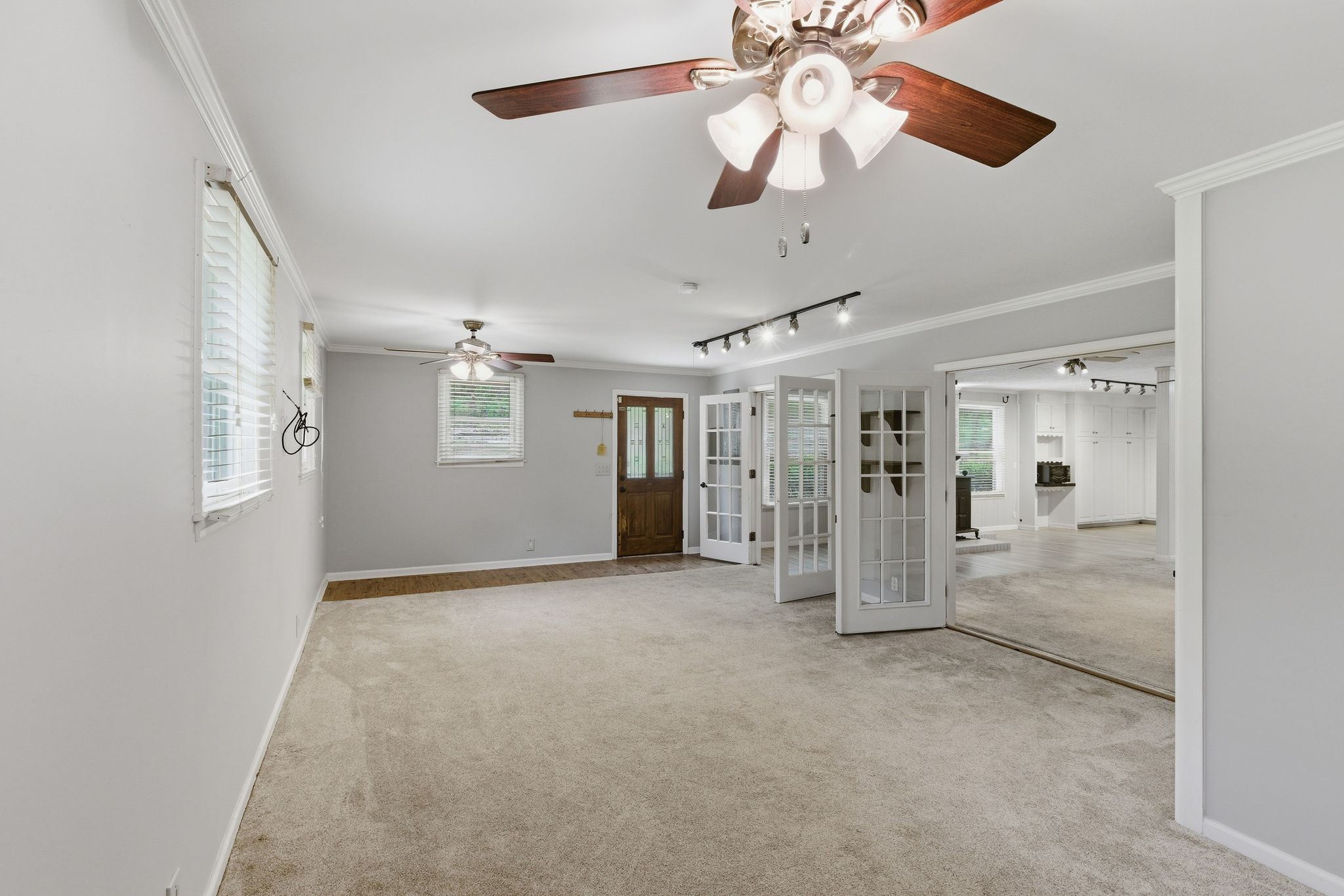580 Defeated Creek Road Centerville, TN 37033 - Photo 25 of 71 a view of a big room with chandelier fan and windows