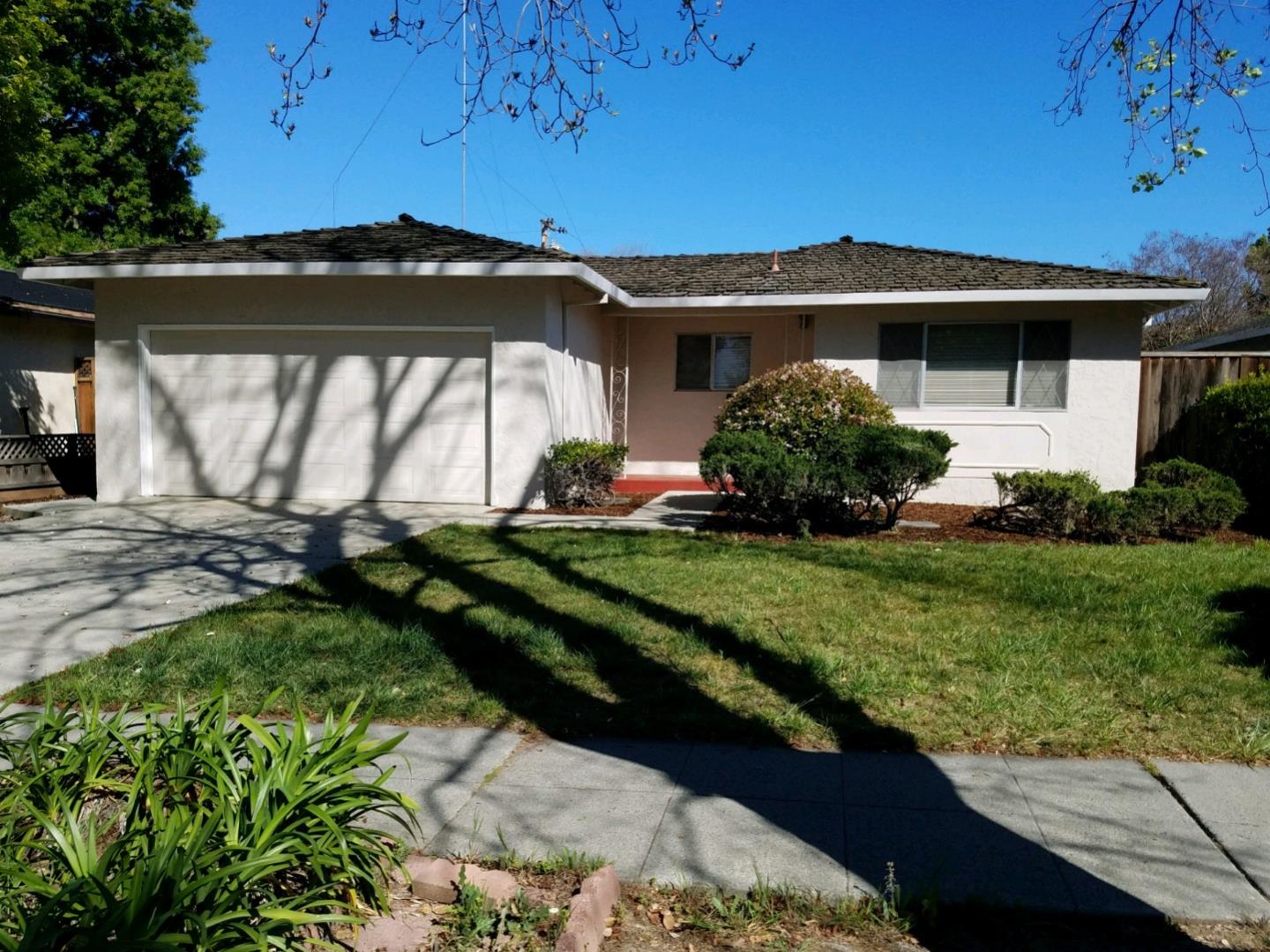 780 Hibiscus Lane San Jose, CA 95117 - Photo 1 of 20 a front view of a house with a yard