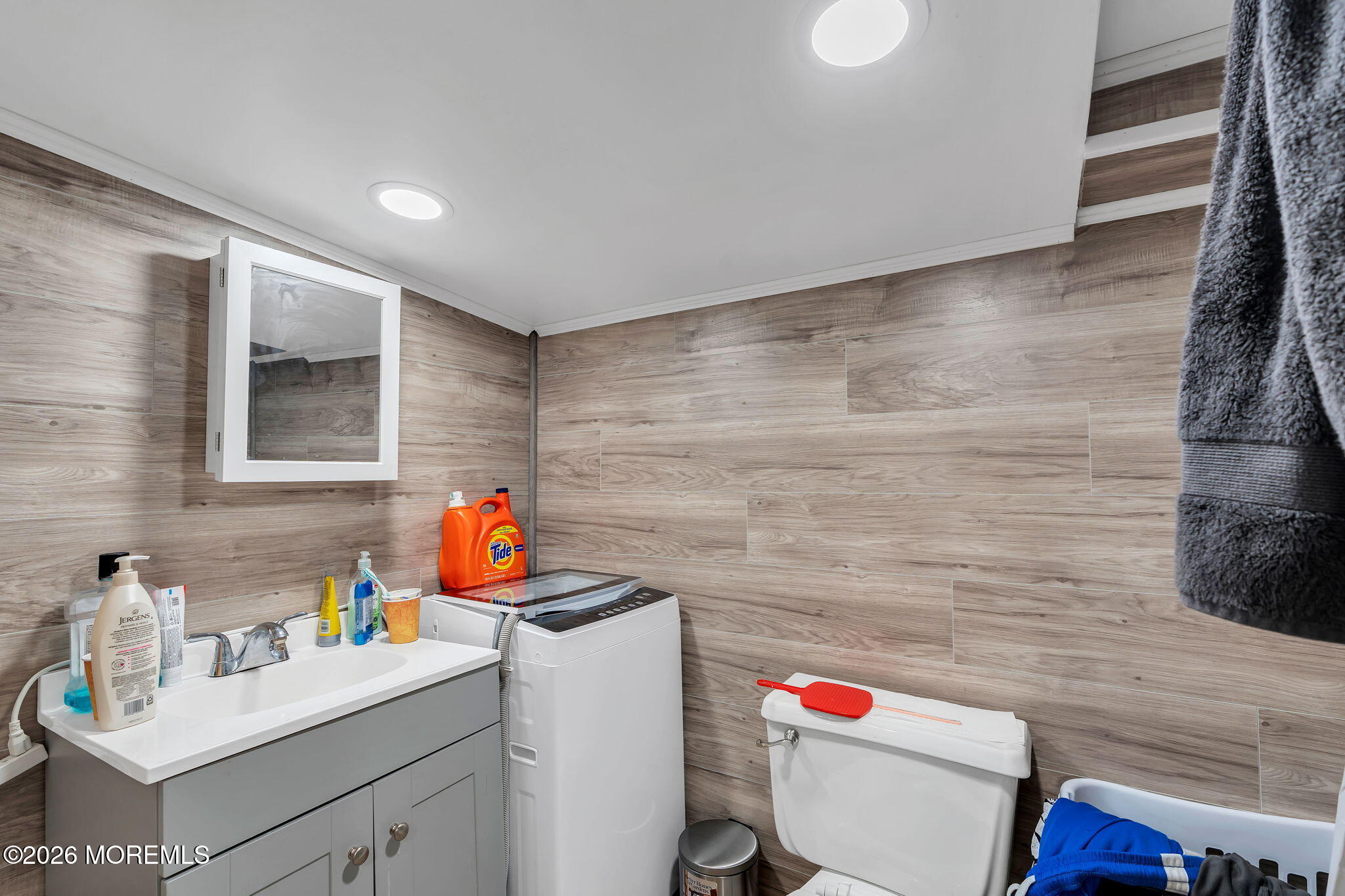 12 Main Street, Unit C Englishtown, NJ 07726 - Photo 2 of 14 a utility room with dryer and washer
