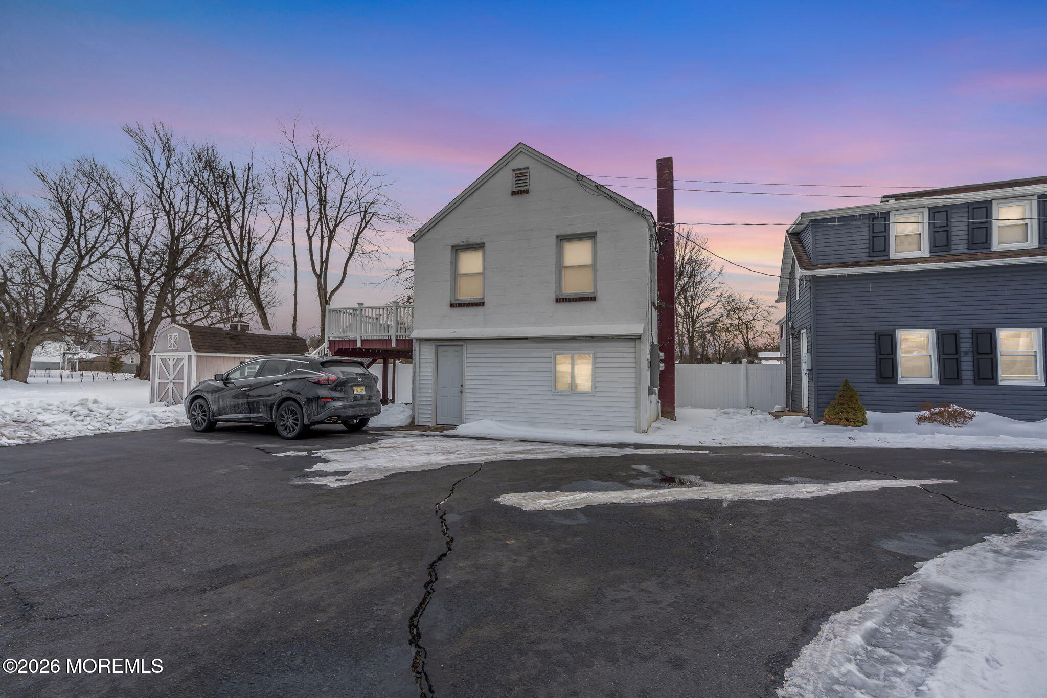 12 Main Street, Unit C Englishtown, NJ 07726 - Photo 5 of 14 a view of house with outdoor space and parking