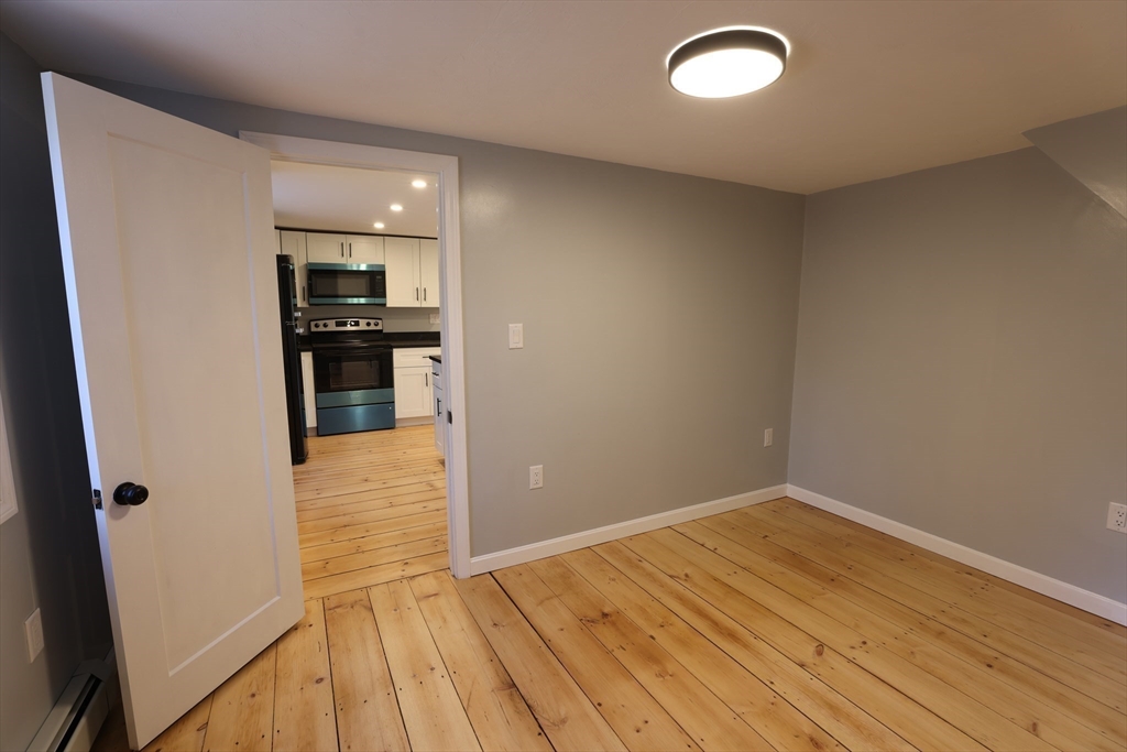 25 Center Hill Road Plymouth, MA 02360 - Photo 15 of 27 a view of a kitchen from the hallway