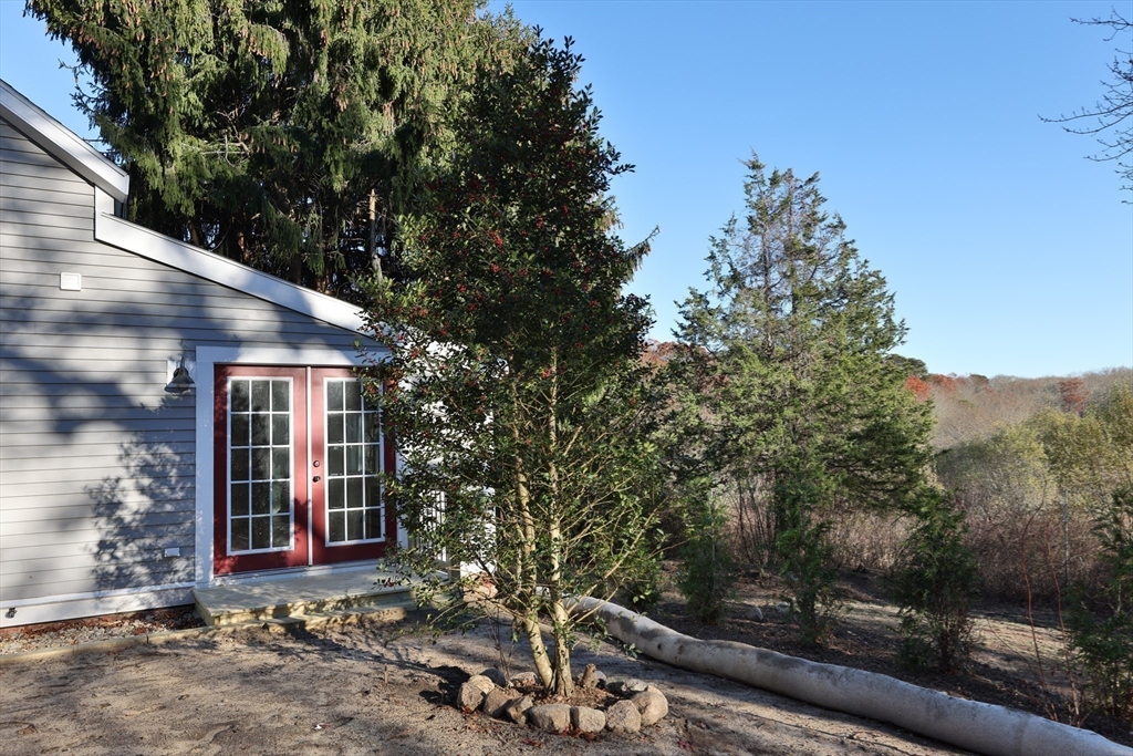 25 Center Hill Road Plymouth, MA 02360 - Photo 21 of 27 a front view of a house with trees