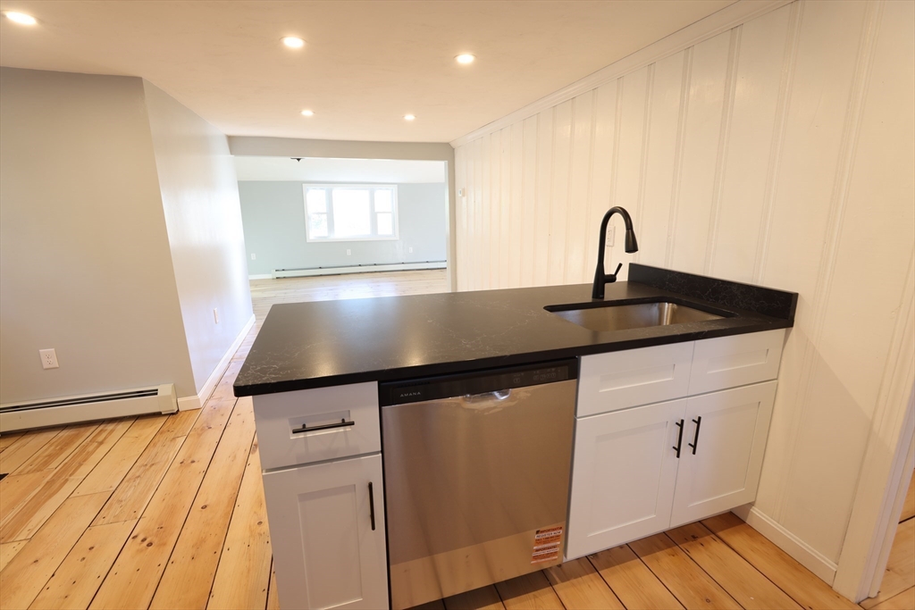 25 Center Hill Road Plymouth, MA 02360 - Photo 7 of 27 a kitchen with a sink and cabinets