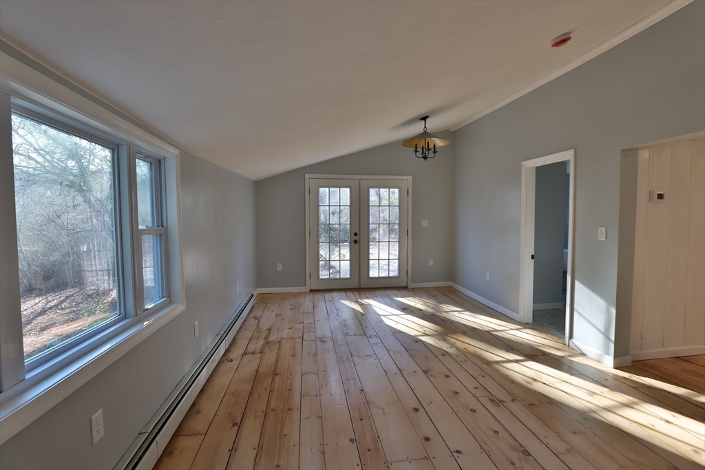 25 Center Hill Road Plymouth, MA 02360 - Photo 9 of 27 a view of an empty room with wooden floor and a window